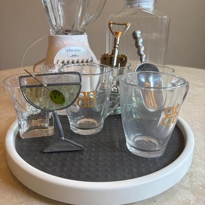 LOT 101: Bar Set-Up Essentials: Osterizer 14speed Blender, Bar Foot Rail Brackets, GreyGoose Spill Mat Runner, Lionstone Whiskey...