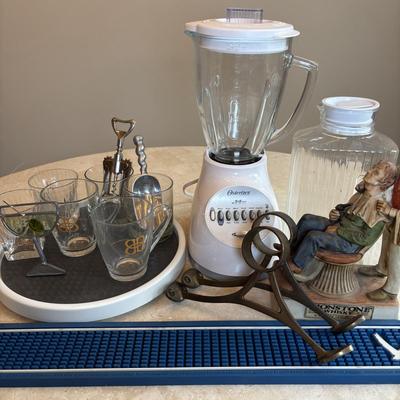 LOT 101: Bar Set-Up Essentials: Osterizer 14speed Blender, Bar Foot Rail Brackets, GreyGoose Spill Mat Runner, Lionstone Whiskey...