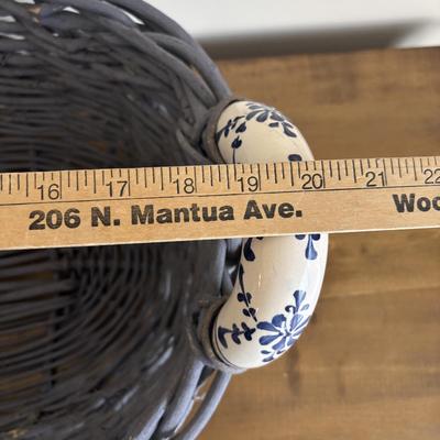 LOT 104: Large Blue Wicker Basket w/Ceramic Handles, LBK Berry Design Pitcher, Blue/White Candlesticks, Metal Flower Vase, Blue Glaze...