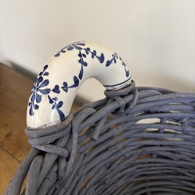 LOT 104: Large Blue Wicker Basket w/Ceramic Handles, LBK Berry Design Pitcher, Blue/White Candlesticks, Metal Flower Vase, Blue Glaze...