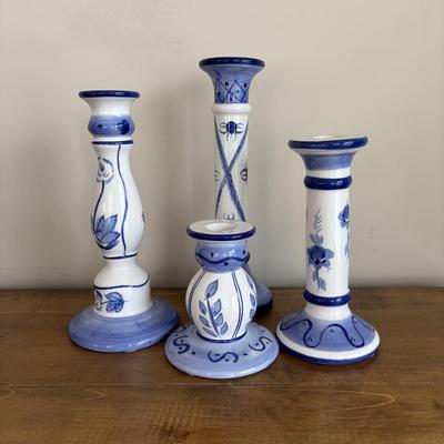 LOT 104: Large Blue Wicker Basket w/Ceramic Handles, LBK Berry Design Pitcher, Blue/White Candlesticks, Metal Flower Vase, Blue Glaze...