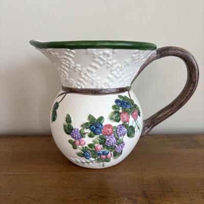 LOT 104: Large Blue Wicker Basket w/Ceramic Handles, LBK Berry Design Pitcher, Blue/White Candlesticks, Metal Flower Vase, Blue Glaze...