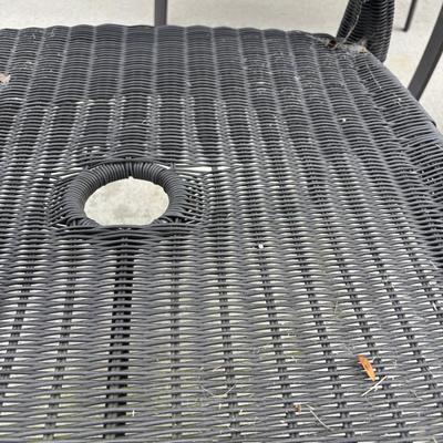 LOT 105: Stylewell Outdoor Patio Chairs along with a Round Wicker & Glass Patio Table