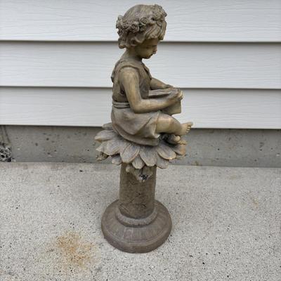 LOT 107: Cast Iron Sundial and Resin Cherub Reading a Book Garden Statue