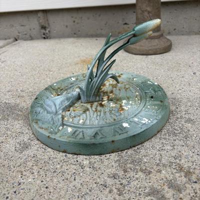 LOT 107: Cast Iron Sundial and Resin Cherub Reading a Book Garden Statue