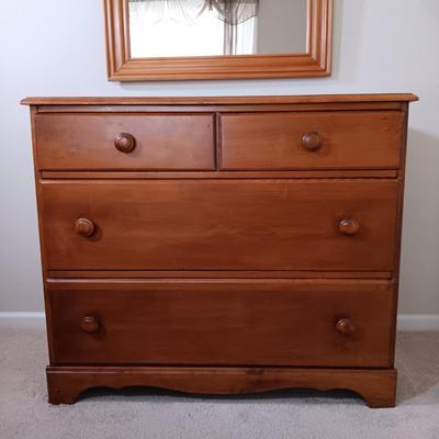 LOT 123: Wood Headboard, Framed Mirror and Dresser