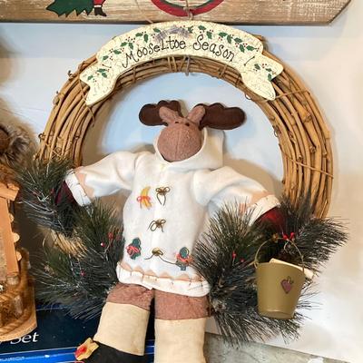 LOT 144: Collection of Christmas / Holiday Decor - Camo Snowman, Mooseltoe Season, Fishing Bear, Lighted Wreath, Nativity Scene and More