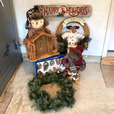 LOT 144: Collection of Christmas / Holiday Decor - Camo Snowman, Mooseltoe Season, Fishing Bear, Lighted Wreath, Nativity Scene and More