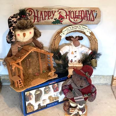 LOT 144: Collection of Christmas / Holiday Decor - Camo Snowman, Mooseltoe Season, Fishing Bear, Lighted Wreath, Nativity Scene and More