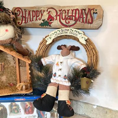 LOT 144: Collection of Christmas / Holiday Decor - Camo Snowman, Mooseltoe Season, Fishing Bear, Lighted Wreath, Nativity Scene and More