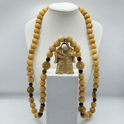 LOT 44J: Japanese Netsuke on Long Prayer Bead Necklace - Laughing / Angry Buddha Toggle Face