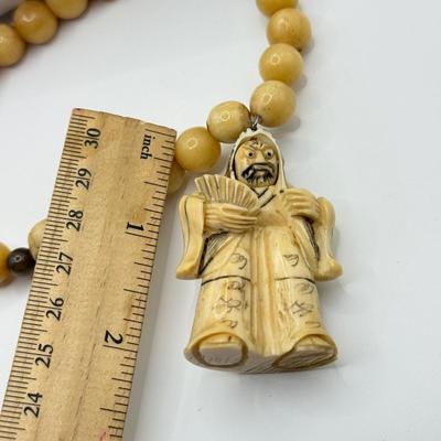 LOT 44J: Japanese Netsuke on Long Prayer Bead Necklace - Laughing / Angry Buddha Toggle Face