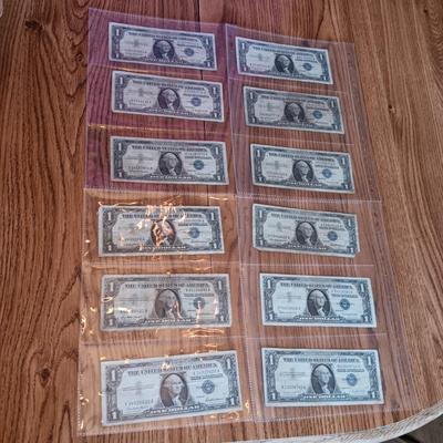 TWELVE SILVER CERTIFICATE 1 DOLLAR BILLS