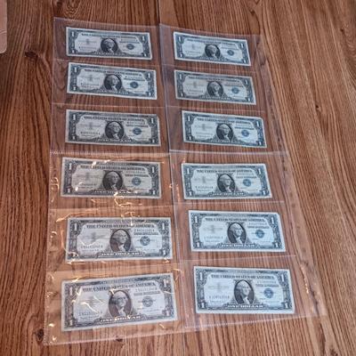 TWELVE SILVER CERTIFICATE 1 DOLLAR BILLS