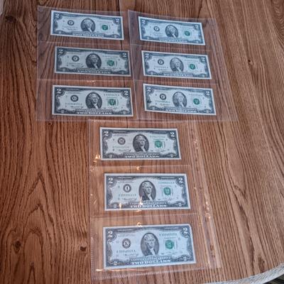 NINE 2 DOLLAR BILLS