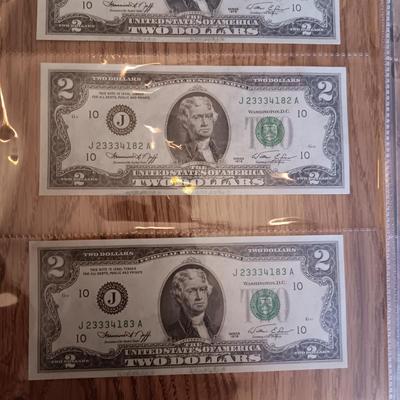 TWELVE SEQUENTIAL 2 DOLLAR BILLS