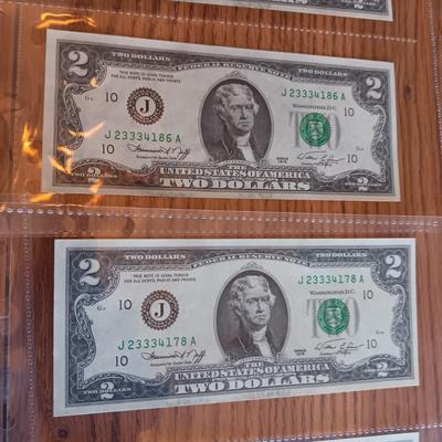 TWELVE SEQUENTIAL 2 DOLLAR BILLS