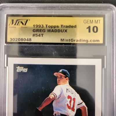 Sale Photo Thumbnail #385: 1993 Topps Traded Greg Maddux Mint GEM MT 10
