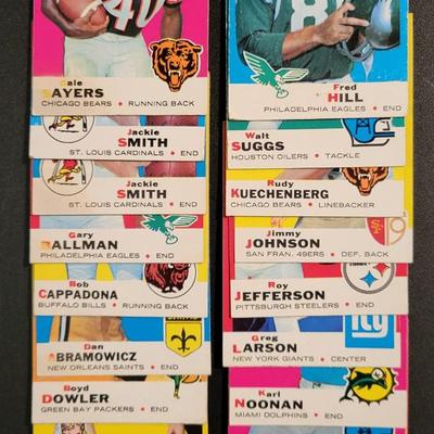 Sale Photo Thumbnail #692: 1969 Topps Various Players. (20 CARDS) Fred Hill card has damage on right top corner
Gale Sayers, Jackie Smith (2), Gary Ballman, Bob Cappadona, Dan Abramowicz RC, Boyd Dowler, Bob Matheson, Bryon Piccolo RC, Sherrill Headrick
Fred Hill, Walt Suggs, Rudy 