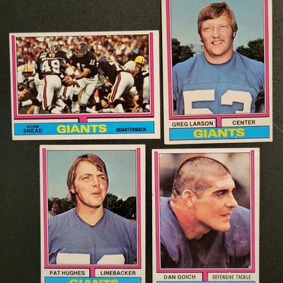 Sale Photo Thumbnail #717: 1974 Topps Giants (19 Cards)
Norm Snead, Willie Williams, Tom Blanchard, John Mendenhall, Spider Lockhart, Ron Johnson, Don Goich, Pat Hughes, Greg Larson, Doug Van Horn, Pete Athas, Don Herrmann, Randy Johnson, Jim Files, Vince Clements, Bob Gim, Pete Go