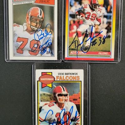 Sale Photo Thumbnail #748: 1979 Topps Steve Bartkowski Signed NO COA
1987 Topps Bill Fralic Signed NO COA 
1990 Score Keith Jones Signed NO COA.  
Signed cards have no COA's.