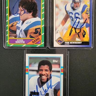 Sale Photo Thumbnail #764: 1986 Topps Doug Smith SIGNED NO COA
1991 Score Tom Newberry. SIGNED NO COA
1989 Topps Mike Wilcher SIGNED NO COA
NO COA'S for signed cards.