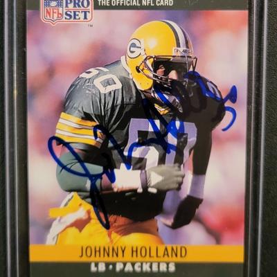 Sale Photo Thumbnail #774: 1990 Pro Set Johnny Holland, SIGNED NO COA
1990 Pro Set Sam Wyche. SIGNED NO COA
 NO COA'S for signed cards
