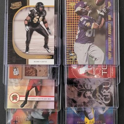 Sale Photo Thumbnail #792: 1997-2000 Collectors Edge Troy Walter's  Rookie, 2009  Press Pass Aaron Curry Rookie, Troy Davis Numbered 2682/3000