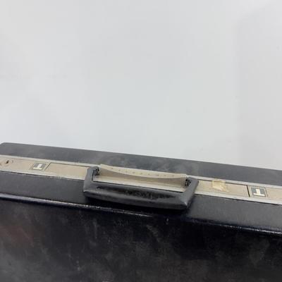 Attaché Case: Lawyers, Guns and Money 