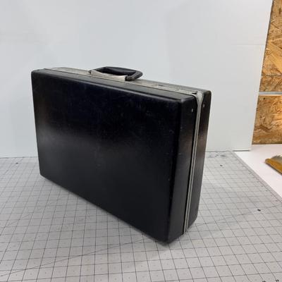 Attaché Case: Lawyers, Guns and Money 