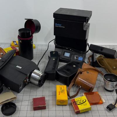 Camera, Light Meters, Slide Printers, Lenses ETC.