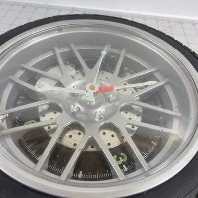 CLOCK! Looks like a Tire, funny! 
