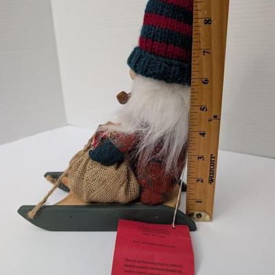 The Gnommery Christmas Gnome On Wooden Sled With Pipe And Gift Sack