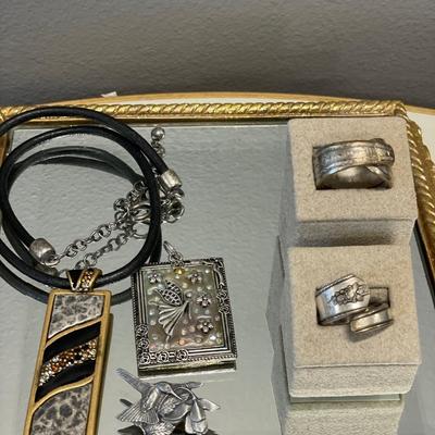 Chico necklace, silverware rings, birds pin and pendant