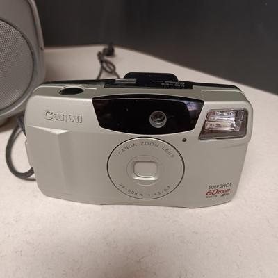 CANON SURE SHOT 35MM & POLAROID CAMERA PLUS A CURTIS RADIO/CD PLAYER (NO ANTENNA)