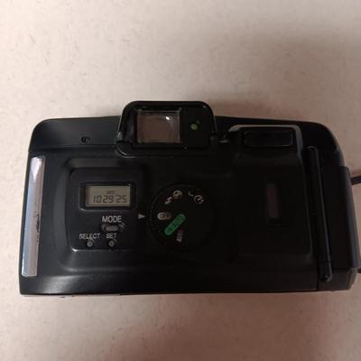 CANON SURE SHOT 35MM & POLAROID CAMERA PLUS A CURTIS RADIO/CD PLAYER (NO ANTENNA)