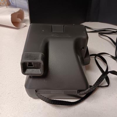 CANON SURE SHOT 35MM & POLAROID CAMERA PLUS A CURTIS RADIO/CD PLAYER (NO ANTENNA)