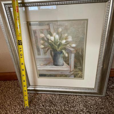 Faux plant with wall decor