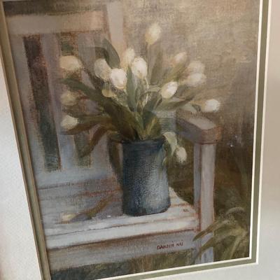 Faux plant with wall decor