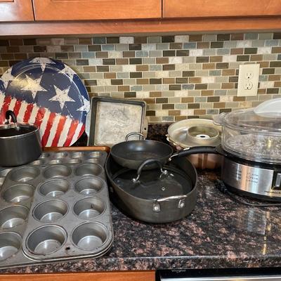 Tins and cookie sheets with steamer