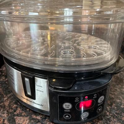 Tins and cookie sheets with steamer