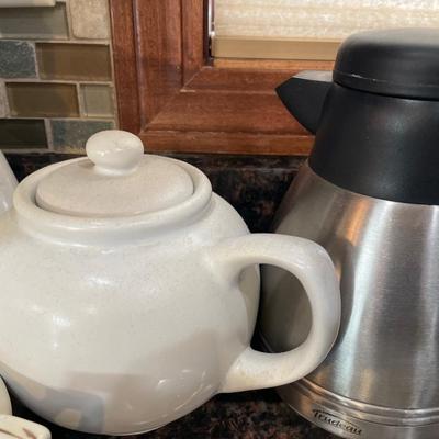 Cups, stemware, napkin, holder and more