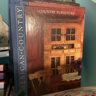 Green plastic bin with crafting CDs & books