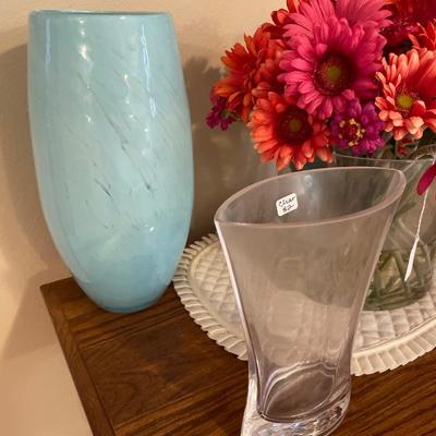 Faux flowers and 3 vases