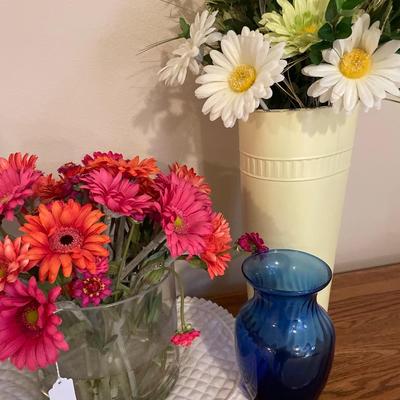 Faux flowers and 3 vases