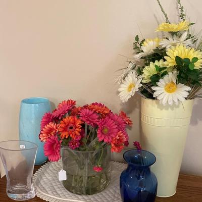 Faux flowers and 3 vases