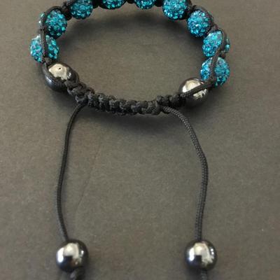 Beautiful Ocean blue rhinestone corded slider bracelet