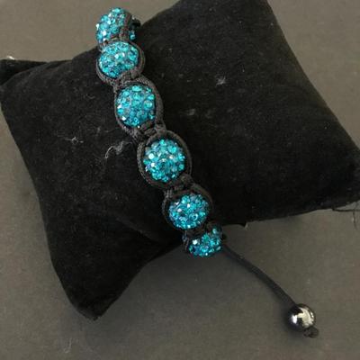 Beautiful Ocean blue rhinestone corded slider bracelet