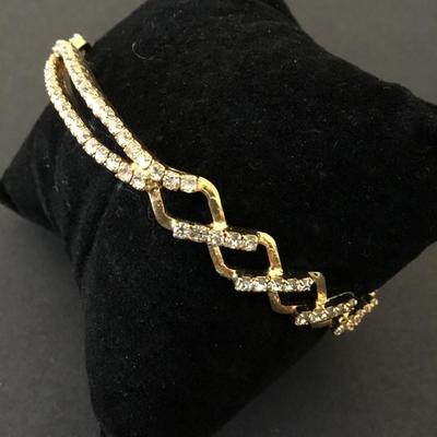Beautiful, gold tone, rhinestone bangle bracelet