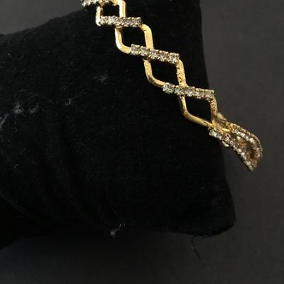 Beautiful, gold tone, rhinestone bangle bracelet